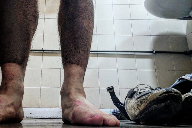Chris Luche bikepacking muddy legs