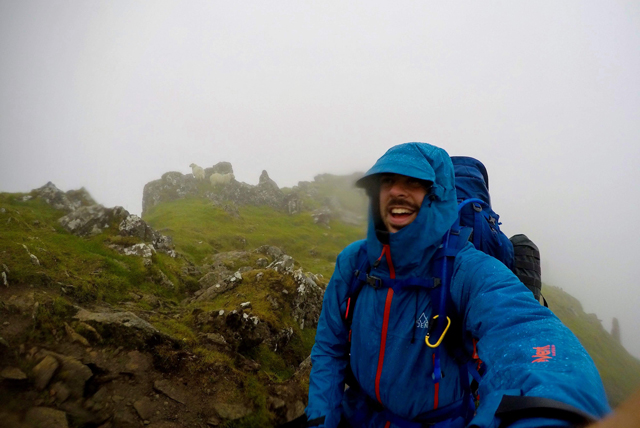 Tom Young in the rain on a mountain