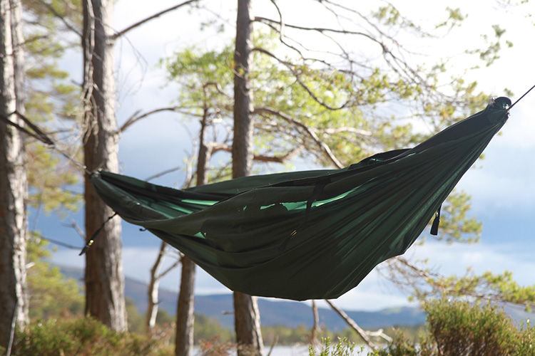 DD SuperLight Jungle Hammock by a loch with base layers only