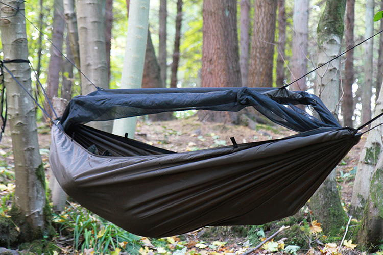 DD Frontline Hammock with mosquito net in the woods